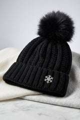 Black Knitted Pom Pom Beanie Cap With Snowflake Detail - Moon