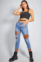 Light Blue Distressed Ripped Skinny Jeans with Fishnet Tights - Delilah