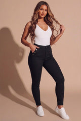 Black High Waisted Button Detail Skinny Jeans- Zenkina